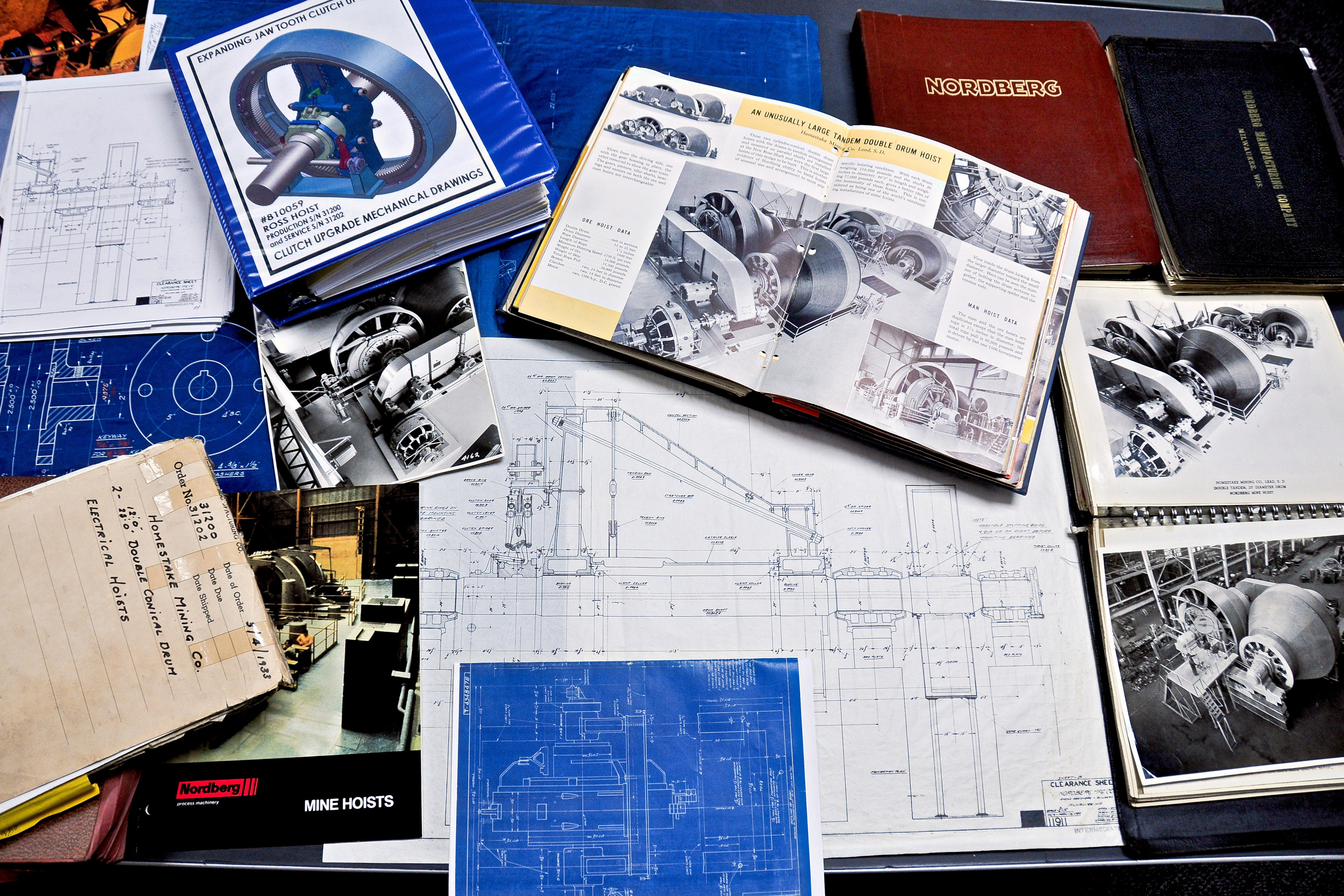 photograph of a table full of old documents