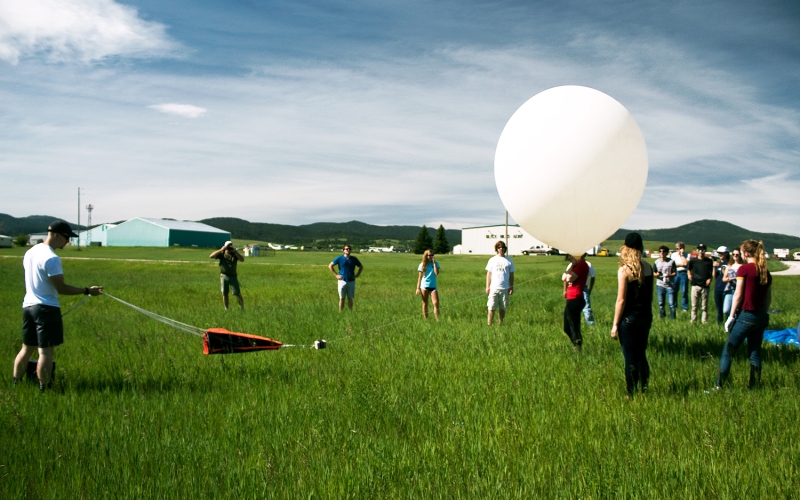 Students, educators, parent volunteers, and Davis-Bahcall scholars prepare to launch a practice NASA weather balloon in preparation for the Total Solar Eclipse 2017 event at the Black Hills Airport in Spearfish, S. Dakota on June 9, 2017.