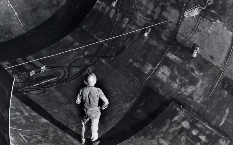 Ray Davis look in a tank being built for a solar neutrino experiment.