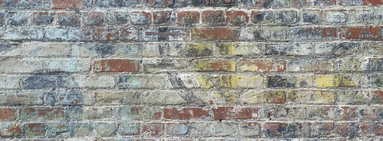 a brick wall representing the solid foundation of knowledge built with consistent effort and the right resources