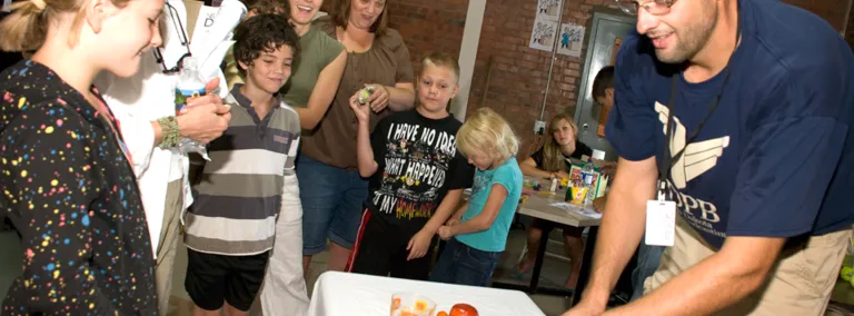 Science Steve talks to a kid.