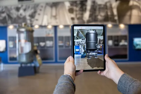 The view of the LZ experiment sitting next to the LUX experiment in augmented reality at the Sanford Lab Homestake Visitor Center.